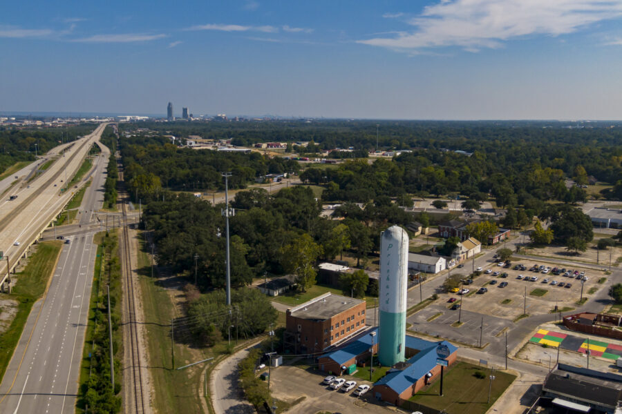 Aerial view of Prichard, Alabama, with the city water tower and downtown